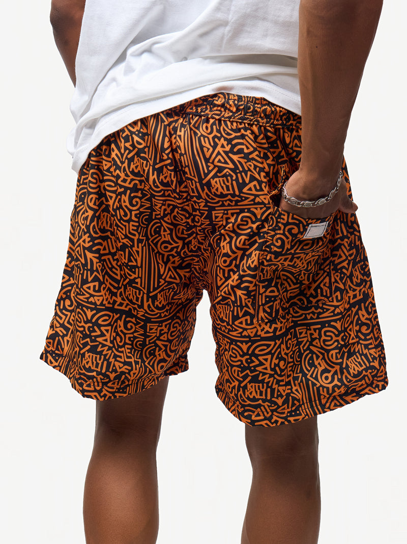 Kali Swim Shorts: Men - Black & Gold KK