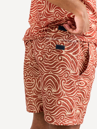 Kali Swim Shorts: Men - Orange Wave Print